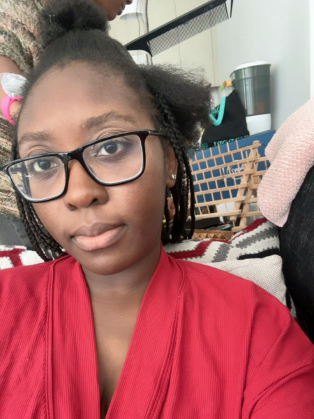 Woman getting her hair braided